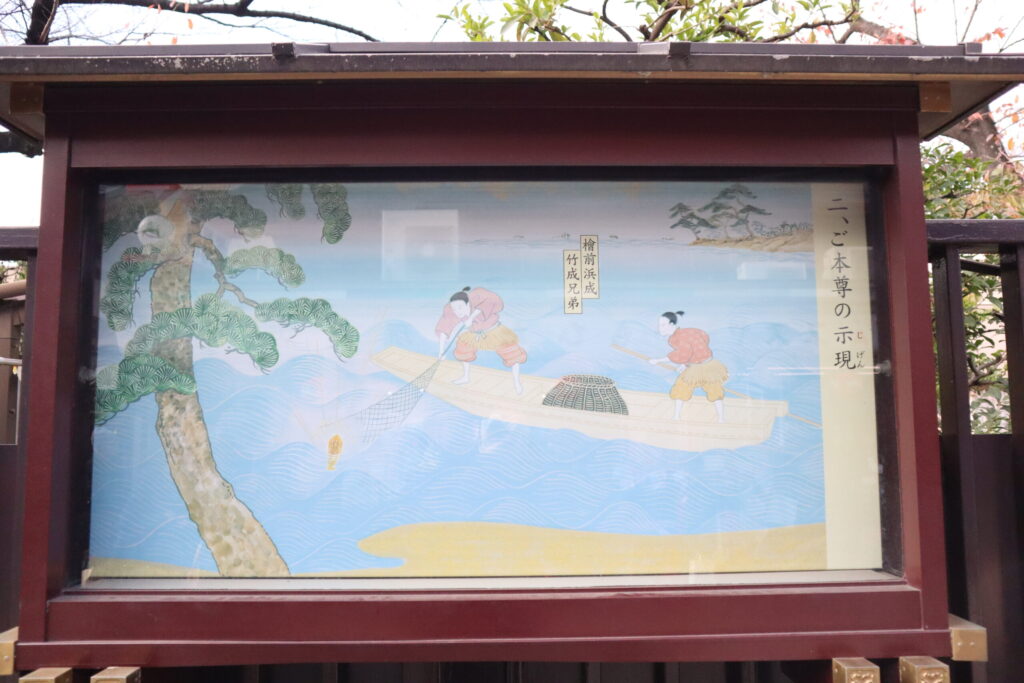 仲見世通りに展示された、浅草の歴史を描いた絵（隅田川の漁で観音像が見つかった伝説の場面）